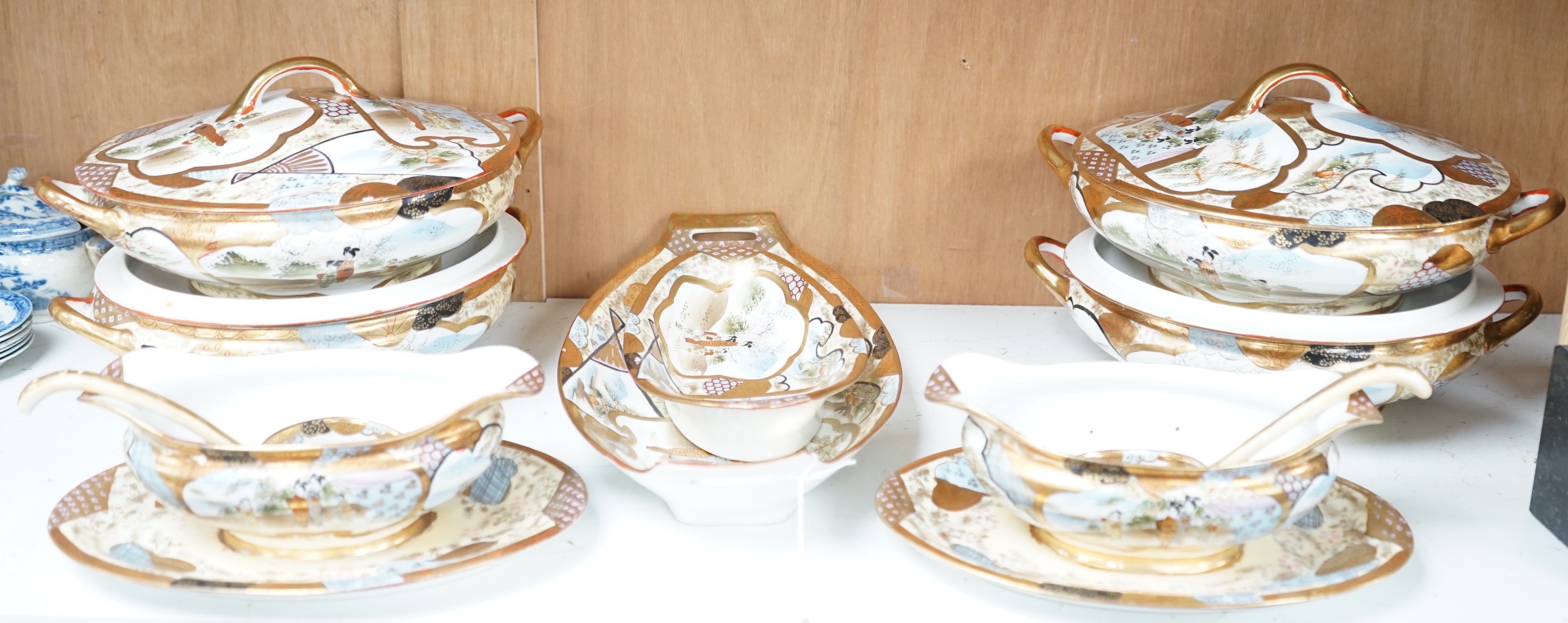 A 20th century Japanese Kutani part dinner service